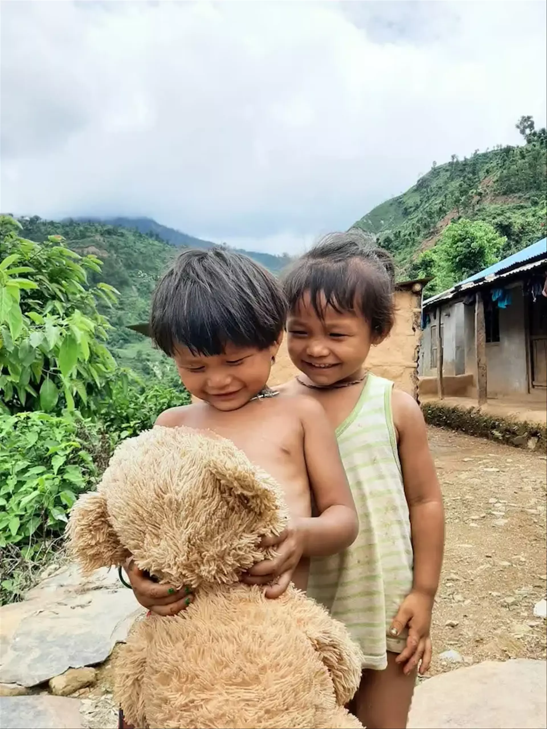 Kids playing with a doll